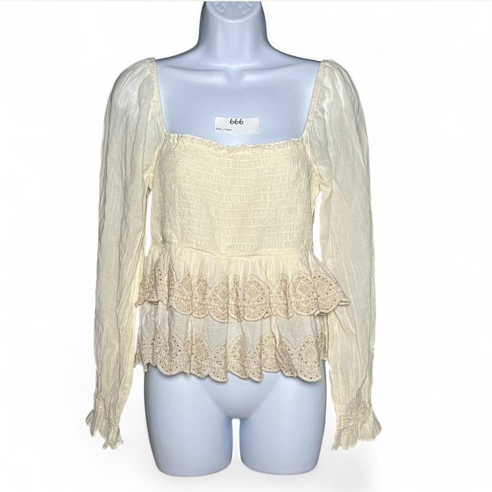American Eagle Outfitters Cream smocked tiered long sleeve top.